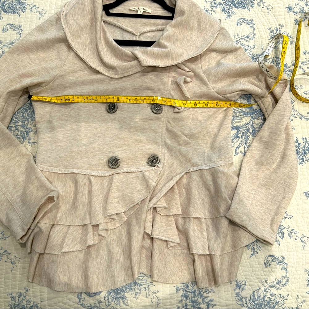 Cute, cute short jacket, double breasted with tiers. Size L but fits like S/M.